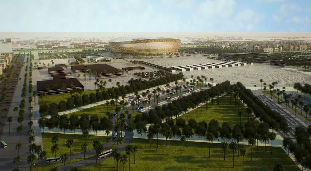 An architect's rendering of Lusail Stadium. The glossy, oval-shaped stadium sits in the center behind a long, triangular, tree-lined boulevard and a large parking lot and outbuildings.